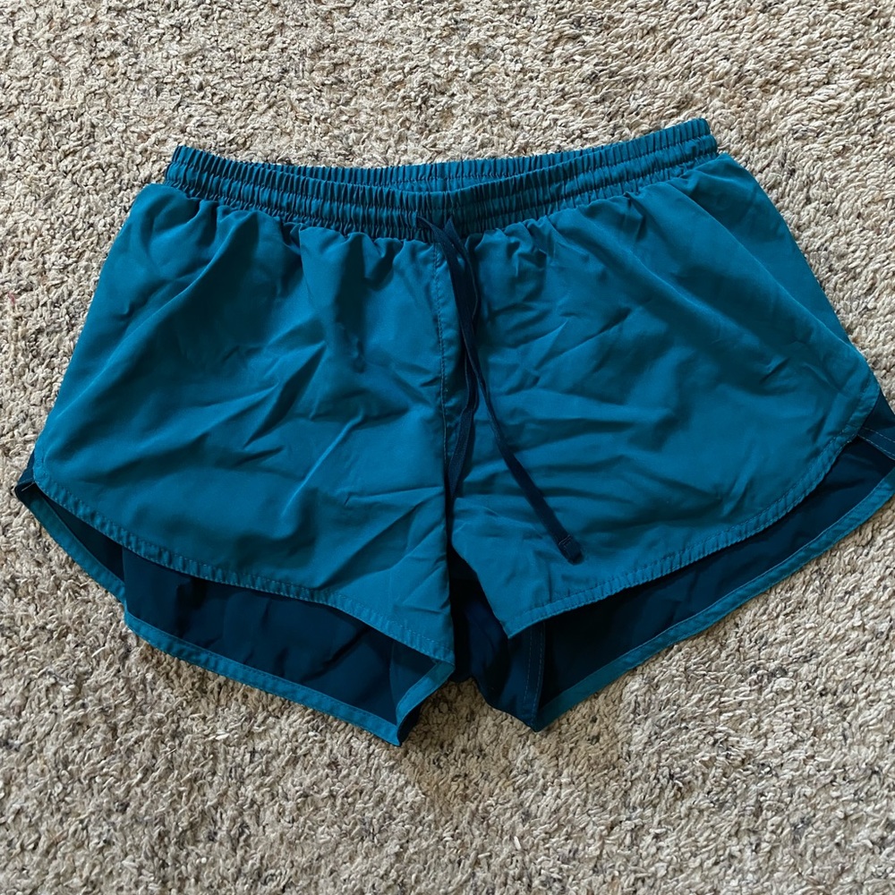 Teal running shorts